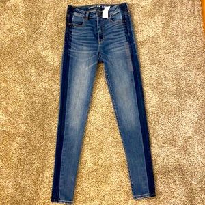 American eagle size 8 long jeans super stretch with dark stipe detail down side
